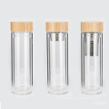 Tapa de bambú de la botella de agua de cristal con la botella de agua de cristal motivacional del infusor del té